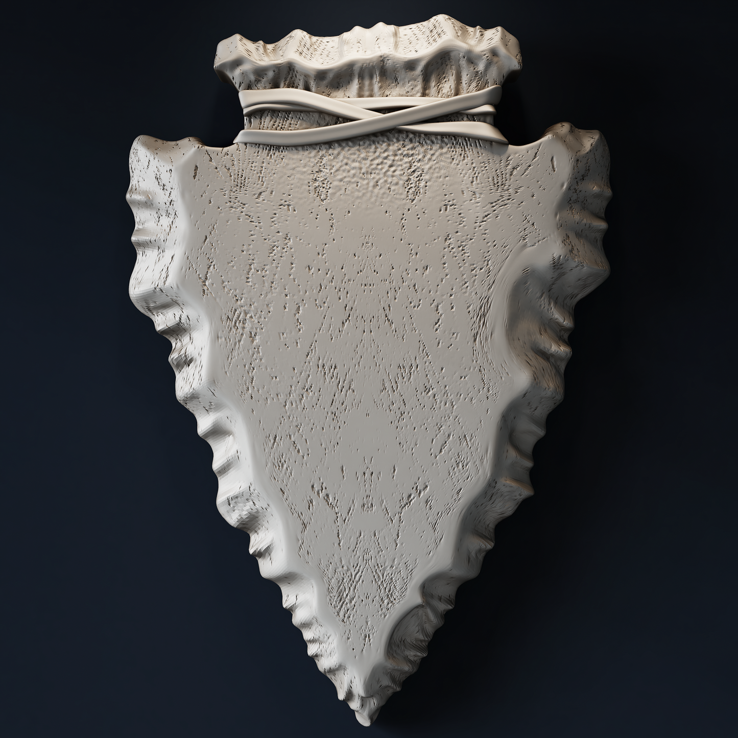 Native American arrowhead relief carved in wood.